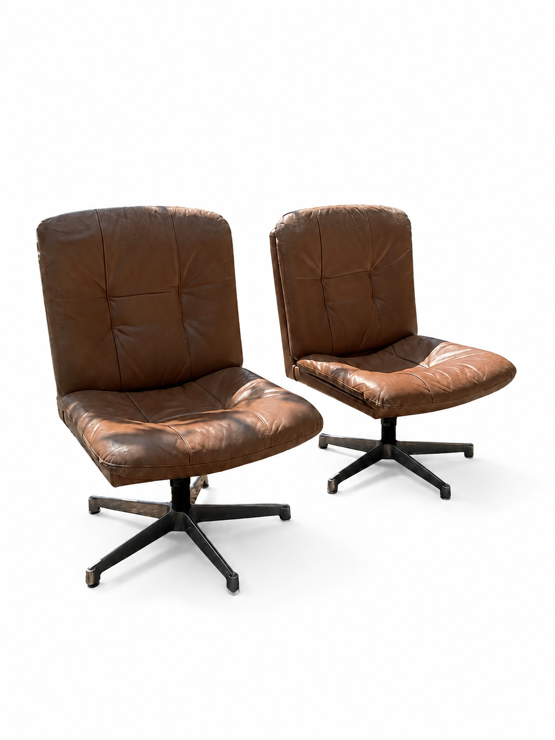 Set van 2 vintage draaifauteuils in cognac